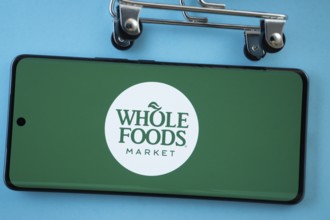 Dhaka, Bangladesh- 03 July 2025: Smartphone screen showing the Whole Foods Market logo with