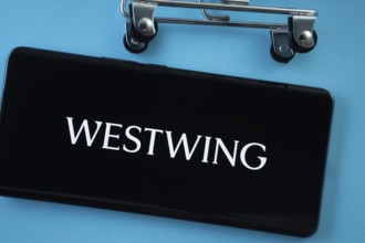 Dhaka, Bangladesh- 03 July 2025: Smartphone screen showing the Westwing logo with shopping cart