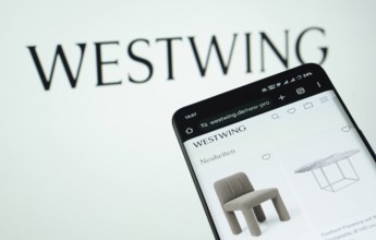 Dhaka, Bangladesh- 03 July 2025: Smartphone displaying Westwing web interface against Westwing logo