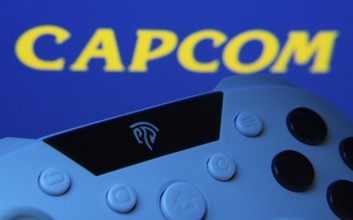 Dhaka, Bangladesh- 15 Sep 2025: A close-up of a gamepad with the Capcom seen on screen in the