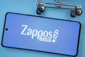 Dhaka, Bangladesh- 03 July 2025: Smartphone screen showing the Zappos logo with shopping cart