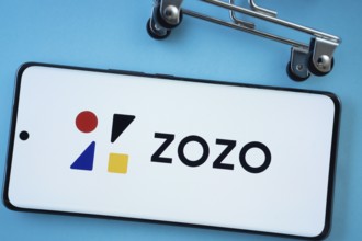 Dhaka, Bangladesh- 03 July 2025: Smartphone screen showing the ZOZO logo with shopping cart wheels