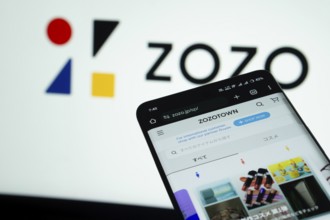 Dhaka, Bangladesh- 03 July 2025: Smartphone displaying ZOZO web interface against ZOZO logo