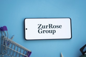 Dhaka, Bangladesh- 03 July 2025: Smartphone displaying Zur Rose Group logo with shopping cart on a