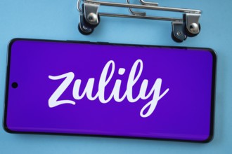 Dhaka, Bangladesh- 03 July 2025: Smartphone screen showing the Zulily logo with shopping cart