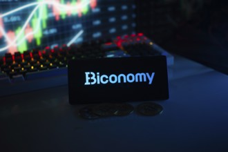 Biconomy logo shown with coins and digital graphs in a dim, high-tech setting