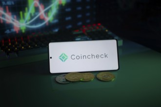 Coincheck logo featured with coins and digital market graphs, creating an advanced trading scene