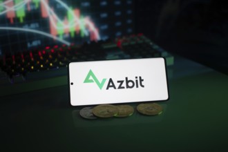 Azbit logo with coins and trading charts illuminated by green lighting
