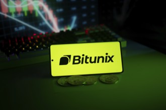 Bitunix logo in a bright neon green setting with coins and trading charts in the background