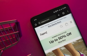 Dhaka, Bangladesh- 23 June 2025: A smartphone displaying the Zappos website with a shopping cart is