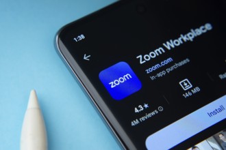 Dhaka, Bangladesh- 16 March 2025: The zoom app from Google Playstore is displayed on a smartphone