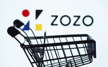 Dhaka, Bangladesh- 03 July 2025: Silhouette of a shopping cart in front of the ZOZO logo,
