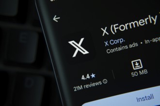 Dhaka, Bangladesh- 27 July 2025: X app from Google Playstore is displayed on a smartphone screen