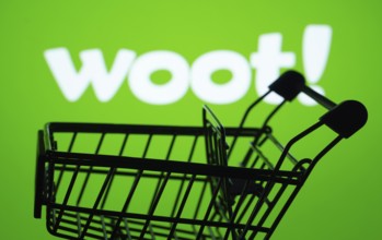 Dhaka, Bangladesh- 03 July 2025: Silhouette of a shopping cart in front of the Woot logo,
