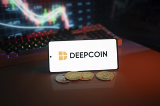 Deepcoin logo on smartphone with coins, orange neon lights, and trading charts in background