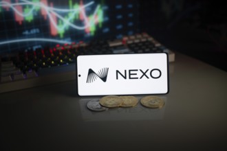 NEXO logo displayed with coins and market graph amid neon lights