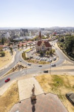 The bronze statue of Dr. Sam Nujoma and Christuskirche is a historic Lutheran church in Windhoek,