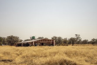 Outjo is a quiet Namibian town surrounded by savannas and hills, with dry sunny nature, calm daily