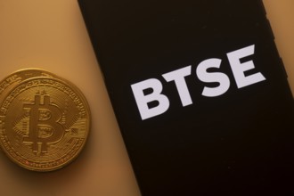 A Bitcoin coin paired with a smartphone displaying the BTSE logo in orange