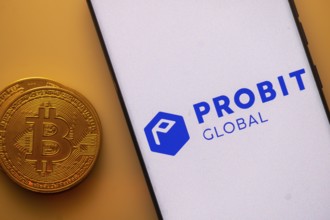 Probit Global logo on a smartphone screen beside a Bitcoin coin