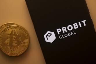 Bitcoin coin beside Probit Global logo on a black background, pertaining to crypto exchange