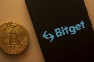 Bitcoin coin adjacent to Bitget logo on a black background, representing crypto trading