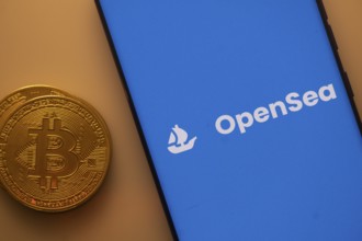 Bitcoin coin alongside OpenSea logo on a blue background, related to NFT trade