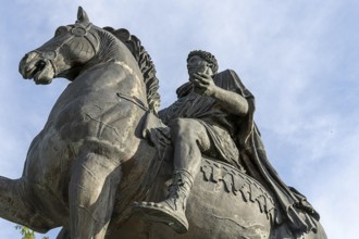 Close-up of a historical equestrian statue focussing on details of horse and rider Marcus Aurelius,
