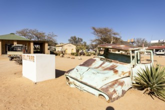 Solitaire's car graveyard in Namibia - 27 August, 2025: features rusted vintage cars near small