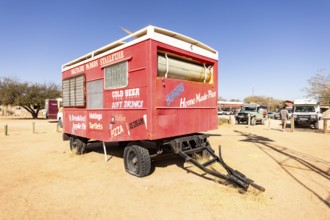 Solitaire's car graveyard in Namibia - 27 August, 2025: features rusted vintage cars near small