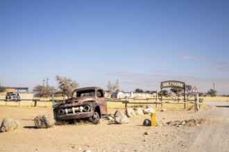 Solitaire's car graveyard in Namibia - 27 August, 2025: features rusted vintage cars near small