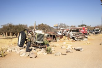 Solitaire's car graveyard in Namibia 27 August, 2025: features rusted vintage cars near small