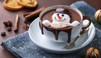 Snowman made of whipped cream floating in hot chocolate for christmas, AI generated