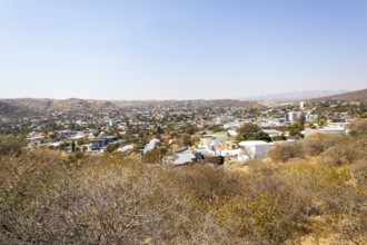 A panoramic view of Windhoek, Namibia, from the National Botanic Garden, showing the city's mix of