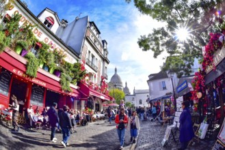 Place du Tertre in the Parisian artists' quarter of Montmartre in Paris, with the Sacre Coeur