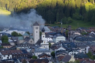 View of a burning building in the town centre of San Candido, San Candido, Val Pusteria, Sesto