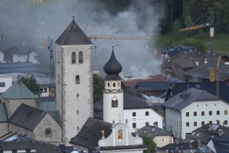 View of a burning building in the town centre of San Candido, San Candido, Val Pusteria, Sesto