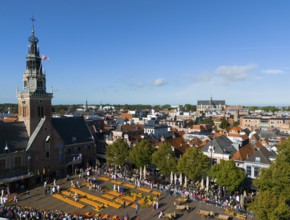 View over town with church and market square, surrounded by historic buildings, aerial view,