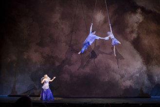 Singer and two artists at the press screening of Alizé, a joint production by Cirque du Soleil and