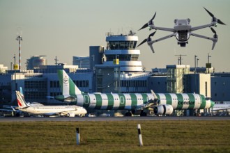 Symbolic image, photomontage, reconnaissance, spying with drones here at an airport, critical