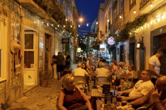 Gastronomy, restaurants in Tavira, old town, partly streets, alleys are closed and serve as