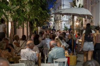 Gastronomy, restaurants in Tavira, old town, partly streets, alleys are closed and serve as