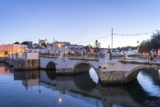 The seven-arched bridge over the Rio Gilão, in Tavira, old town, in the east of the Algarve,