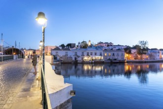 The seven-arched bridge over the Rio Gilão, in Tavira, old town, in the east of the Algarve,