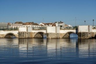 The seven-arched bridge over the Rio Gilão, in Tavira, old town, in the east of the Algarve,