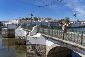 The seven-arched bridge over the Rio Gilão, in Tavira, old town, in the east of the Algarve,
