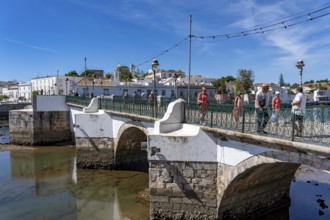 The seven-arched bridge over the Rio Gilão, in Tavira, old town, in the east of the Algarve,