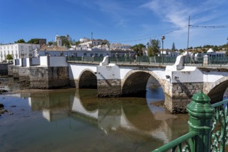 The seven-arched bridge over the Rio Gilão, in Tavira, old town, in the east of the Algarve,
