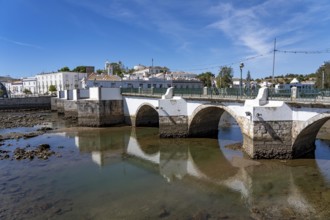 The seven-arched bridge over the Rio Gilão, in Tavira, old town, in the east of the Algarve,