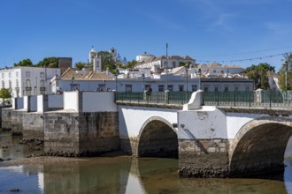 The seven-arched bridge over the Rio Gilão, in Tavira, old town, in the east of the Algarve,